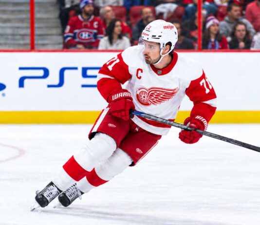 Dylan Larkin of the Detroit Red Wings skating past Montreal Canadiens fans as Canadiens trade rumors continue to link him to Montreal.