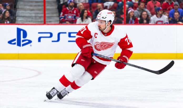 dylan-larkin-montreal-canadiens-trade-rumors-red-wings Dylan Larkin of the Detroit Red Wings skating past Montreal Canadiens fans as Canadiens trade rumors continue to link him to Montreal.