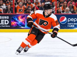 Dylan Larkin in a Philadelphia Flyers home jersey amid NHL trade rumors linking the Detroit Red Wings center to Philadelphia.