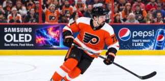 Dylan Larkin in a Philadelphia Flyers home jersey amid NHL trade rumors linking the Detroit Red Wings center to Philadelphia.