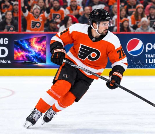 Dylan Larkin in a Philadelphia Flyers home jersey amid NHL trade rumors linking the Detroit Red Wings center to Philadelphia.