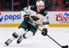 Dylan Larkin Trade Rumors: Did Detroit’s GM Change Reopen the Door for the Wild? Dylan Larkin in a Minnesota Wild away uniform concept image amid NHL trade rumors linking the Detroit Red Wings centre to Minnesota.