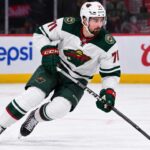 Dylan Larkin Trade Rumors: Did Detroit’s GM Change Reopen the Door for the Wild? Dylan Larkin in a Minnesota Wild away uniform concept image amid NHL trade rumors linking the Detroit Red Wings centre to Minnesota.
