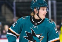 Ivar Stenberg Fantasy Hockey Prediction: How High Can the Sharks Rookie Climb in 2026-27? Ivar Stenberg wearing a San Jose Sharks home jersey and helmet in an action-style image for a 2026-27 fantasy hockey prediction