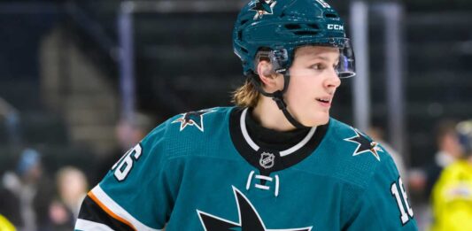 Ivar Stenberg Fantasy Hockey Prediction: How High Can the Sharks Rookie Climb in 2026-27? Ivar Stenberg wearing a San Jose Sharks home jersey and helmet in an action-style image for a 2026-27 fantasy hockey prediction