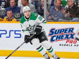 Jason Robertson of the Dallas Stars skates with the puck during NHL action as trade rumors swirl around his future in Dallas.