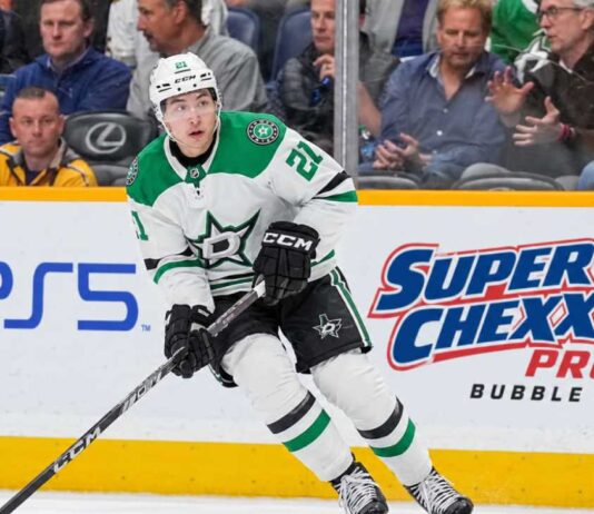 Jason Robertson of the Dallas Stars skates with the puck during NHL action as trade rumors swirl around his future in Dallas.