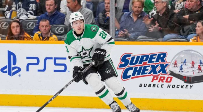 jason-robertson-dallas-stars-trade-rumors Jason Robertson of the Dallas Stars skates with the puck during NHL action as trade rumors swirl around his future in Dallas.