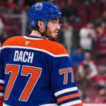 Edmonton Oilers Trade Rumors: Could Kirby Dach Be Montreal’s Next Trade Domino? Kirby Dach in an Edmonton Oilers home jersey amid NHL trade rumors linking the Oilers and Montreal Canadiens.