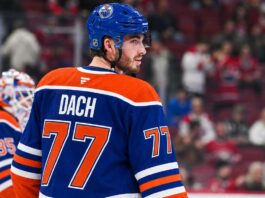 Kirby Dach in an Edmonton Oilers home jersey amid NHL trade rumors linking the Oilers and Montreal Canadiens.