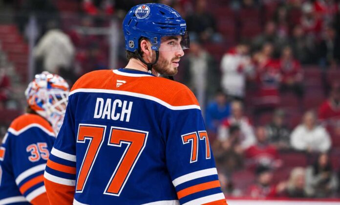 kirby-dach-edmonton-oilers-montreal-canadiens-trade-rumors Kirby Dach in an Edmonton Oilers home jersey amid NHL trade rumors linking the Oilers and Montreal Canadiens.