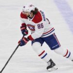 Kirill Marchenko Trade Rumors: Did His Latest Comments Reopen the Canadiens Door? Kirill Marchenko in a Montreal Canadiens uniform skates with the puck in a concept image illustrating Montreal Canadiens trade rumors involving the Columbus Blue Jackets winger.