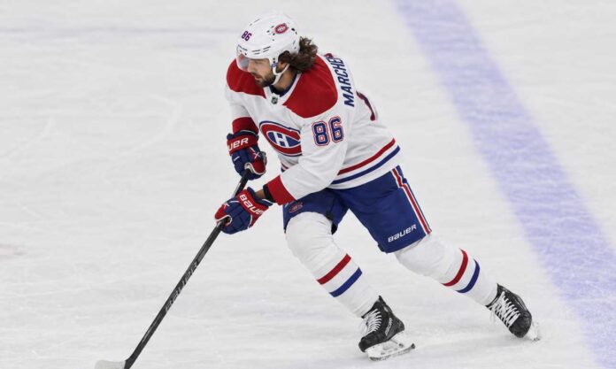 kirill-marchenko-canadiens-trade-rumors-2026 (2) Kirill Marchenko in a Montreal Canadiens uniform skates with the puck in a concept image illustrating Montreal Canadiens trade rumors involving the Columbus Blue Jackets winger.