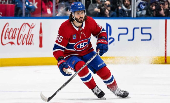 Kirill Marchenko in a Montreal Canadiens home jersey amid trade rumors with the Columbus Blue Jackets