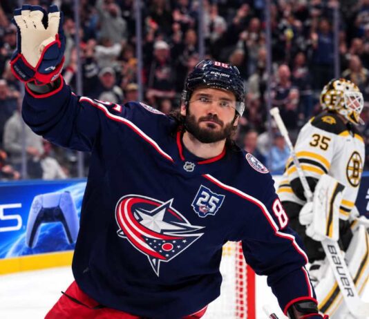 Kirill Marchenko of the Columbus Blue Jackets with a Boston Bruins goalie in the background amid Montreal Canadiens trade rumors