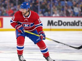 Pavel Zacha wearing a Montreal Canadiens home jersey in a trade rumor image linking the Boston Bruins centre to Montreal.