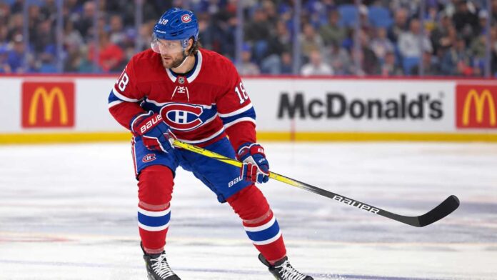 montreal-canadiens-pavel-zacha-boston-bruins-trade-rumors Pavel Zacha wearing a Montreal Canadiens home jersey in a trade rumor image linking the Boston Bruins centre to Montreal.