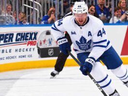Morgan Rielly skating for the Toronto Maple Leafs amid trade rumors about his future in Toronto.