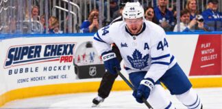 Morgan Rielly skating for the Toronto Maple Leafs amid trade rumors about his future in Toronto.