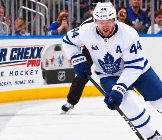 Morgan Rielly skating for the Toronto Maple Leafs amid trade rumors about his future in Toronto.