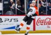 Porter Martone Fantasy Hockey Projection: Can He Reach 70 Points? Porter Martone Philadelphia Flyers 2026-27 fantasy hockey projection with PS5 and Coca-Cola rink board ads