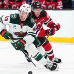 Quinn Hughes Trade Rumors: Did Minnesota’s Final Eight-Year Deadline Reopen the Door for the Devils? Quinn Hughes of the Minnesota Wild skates with the puck as a New Jersey Devils player pressures him during NHL action amid Quinn Hughes trade rumors