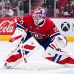 Samuel Montembeault of the Montreal Canadiens in a ready stance during preseason action as trade rumors build around the Canadiens goaltender.