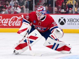 Samuel Montembeault of the Montreal Canadiens in a ready stance during preseason action as trade rumors build around the Canadiens goaltender.