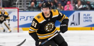 Boston Bruins Trade Rumors: Should Boston Make Its Move for Shane Wright? Shane Wright wearing a Boston Bruins home jersey amid NHL trade rumors involving the Seattle Kraken