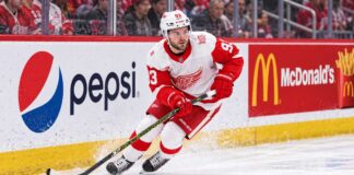 Alex DeBrincat Trade Rumors: Is Detroit’s Chaos About to Put Another Star in Play? Alex DeBrincat skating for the Detroit Red Wings as NHL trade rumors grow around his contract future in Detroit.