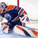 Connor Hellebuyck Trade Rumors: Could the Edmonton Oilers Become Winnipeg’s Surprise Trade Partner? Connor Hellebuyck wearing Edmonton Oilers goalie gear amid NHL trade rumors linking the Winnipeg Jets star to Edmonton.