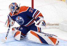 Connor Hellebuyck Trade Rumors: Could the Edmonton Oilers Become Winnipeg’s Surprise Trade Partner? Connor Hellebuyck wearing Edmonton Oilers goalie gear amid NHL trade rumors linking the Winnipeg Jets star to Edmonton.