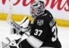 Connor Hellebuyck to the Kings? Winnipeg Jets Face a Trade Decision That Could Change Everything Connor Hellebuyck wearing a Los Angeles Kings jersey and goalie equipment in a conceptual image illustrating NHL trade rumors linking the Winnipeg Jets star goaltender to Los Angeles.