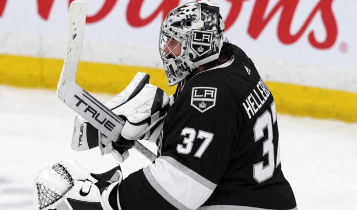 connor-hellebuyck-jets-kings-trade-rumors-2026 Connor Hellebuyck wearing a Los Angeles Kings jersey and goalie equipment in a conceptual image illustrating NHL trade rumors linking the Winnipeg Jets star goaltender to Los Angeles.