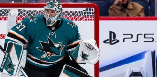 Connor Hellebuyck Would Consider the Sharks: So Why Hasn’t Winnipeg Made the Trade? Connor Hellebuyck in a San Jose Sharks uniform amid NHL trade rumors linking the Winnipeg Jets goalie to San Jose