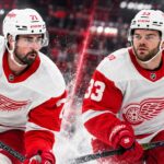 Red Wings Trade Rumors: Did DeBrincat’s $91 Million Deal Just Change Dylan Larkin’s Future? Dylan Larkin and Alex DeBrincat in Detroit Red Wings jerseys as DeBrincat's $91 million contract extension raises questions about Larkin's future amid NHL trade rumors.