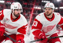 Red Wings Trade Rumors: Did DeBrincat’s $91 Million Deal Just Change Dylan Larkin’s Future? Dylan Larkin and Alex DeBrincat in Detroit Red Wings jerseys as DeBrincat's $91 million contract extension raises questions about Larkin's future amid NHL trade rumors.