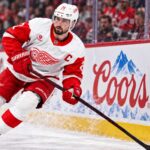 Dylan Larkin skates for the Detroit Red Wings amid NHL trade rumors after being booed during the 2026 home opener.