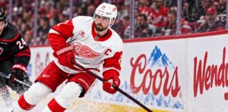 Dylan Larkin skates for the Detroit Red Wings amid NHL trade rumors after being booed during the 2026 home opener.