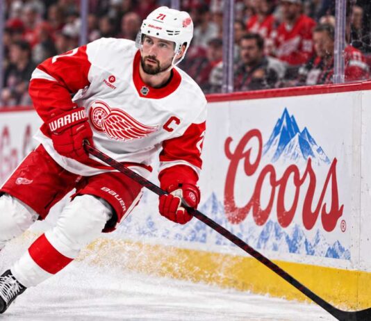 Dylan Larkin skates for the Detroit Red Wings amid NHL trade rumors after being booed during the 2026 home opener.