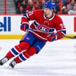 Dylan Larkin Trade Rumors: Is Montreal One Decision Away From a Blockbuster? Dylan Larkin pictured in a Montreal Canadiens home jersey amid NHL trade rumors linking the Detroit Red Wings captain to a potential blockbuster trade with Montreal.