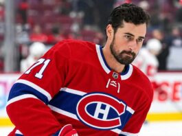 Dylan Larkin pictured in a Montreal Canadiens home jersey as NHL trade rumors intensify following reports that the Detroit Red Wings are scouting Montreal.