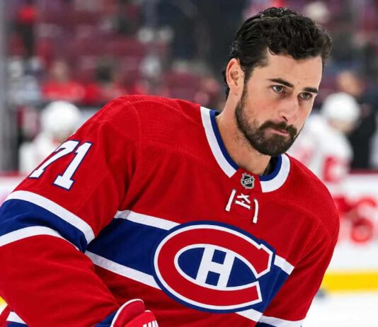 Dylan Larkin pictured in a Montreal Canadiens home jersey as NHL trade rumors intensify following reports that the Detroit Red Wings are scouting Montreal.