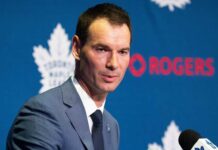 Toronto Maple Leafs general manager John Chayka speaking at a team press conference as Toronto evaluates defensive improvements and potential NHL trades.