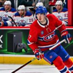 Oilers Trade Rumors: Is Kirby Dach the Mystery Young Center Edmonton Has Been Chasing? Kirby Dach of the Montreal Canadiens skates past Edmonton Oilers players as NHL trade rumors link Dach to a possible Oilers trade.