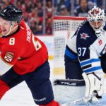 NHL News and Rumors Today: Hellebuyck Decision Looms, Tkachuk Booed in Ottawa Brady Tkachuk in a Florida Panthers jersey and Connor Hellebuyck in a Winnipeg Jets uniform headline NHL news and NHL trade rumors for October 22, 2026.
