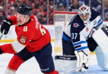 NHL News and Rumors Today: Hellebuyck Decision Looms, Tkachuk Booed in Ottawa Brady Tkachuk in a Florida Panthers jersey and Connor Hellebuyck in a Winnipeg Jets uniform headline NHL news and NHL trade rumors for October 22, 2026.
