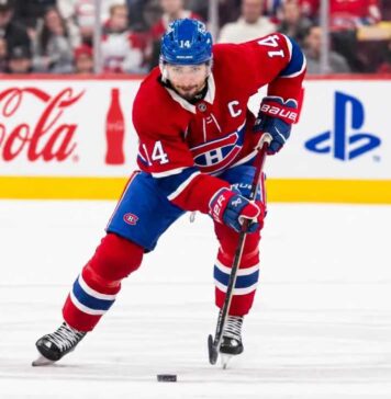 Montreal Canadiens captain Nick Suzuki in action ahead of the October 23, 2026, fantasy hockey matchup against the Chicago Blackhawks.