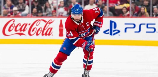 Montreal Canadiens captain Nick Suzuki in action ahead of the October 23, 2026, fantasy hockey matchup against the Chicago Blackhawks.