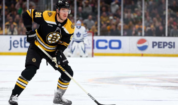 nikita-zadorov-toronto-maple-leafs-boston-bruins-trade-rumors Boston Bruins defenceman Nikita Zadorov skates with the puck against the Toronto Maple Leafs amid NHL trade rumors sparked by comments from his agent, Dan Milstein.